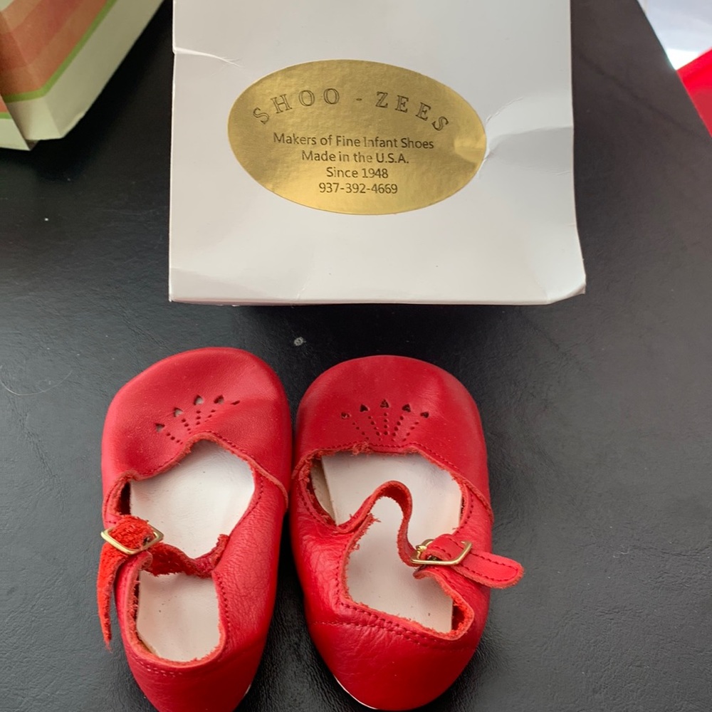 Red Shoo-Zees shoes for infants.